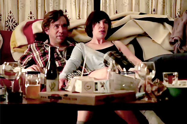 couple zoning out to streaming tv