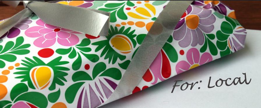 Colourful gift wrapping with note, For: Local