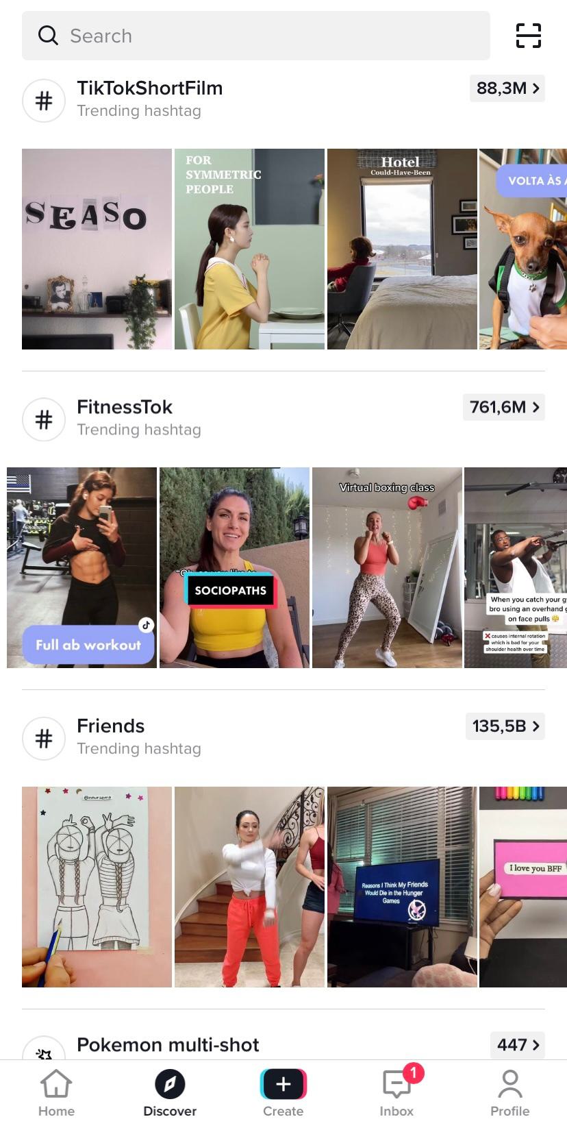 A screenshot of TikTok’s discovery tab featuring the trending hashtags #TikTokShortFilm, #FitnessTok and #Friends.